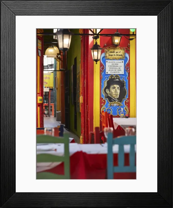 Framed Print : A colorful restaurant inside a historic conventillo'of La Boca neighborhood, Buenos Aires, Argentina Framed Print : A colorful restaurant inside a historic conventillo'of La Boca neighborhood, Buenos Aires, Argentina