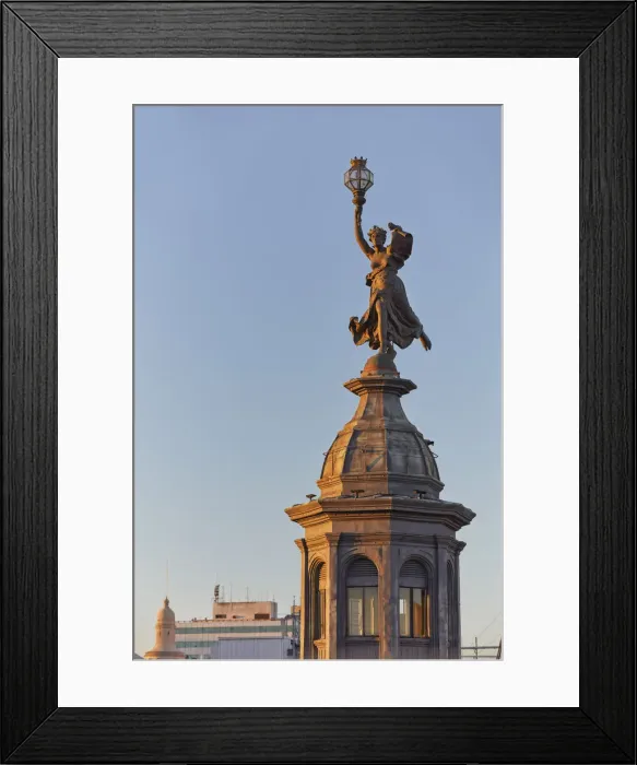 Framed Print : The bronze statue in homage to liberty of La Prensa'building (Beaux Arts) at sunset on Avenida de Mayo, Monserrat, Buenos Aires, Argentina. Once headquarters of the La Prensa'Daily Newspaper Framed Print : The bronze statue in homage to liberty of La Prensa'building (Beaux Arts) at sunset on Avenida de Mayo, Monserrat, Buenos Aires, Argentina. Once headquarters of the La Prensa'Daily Newspaper