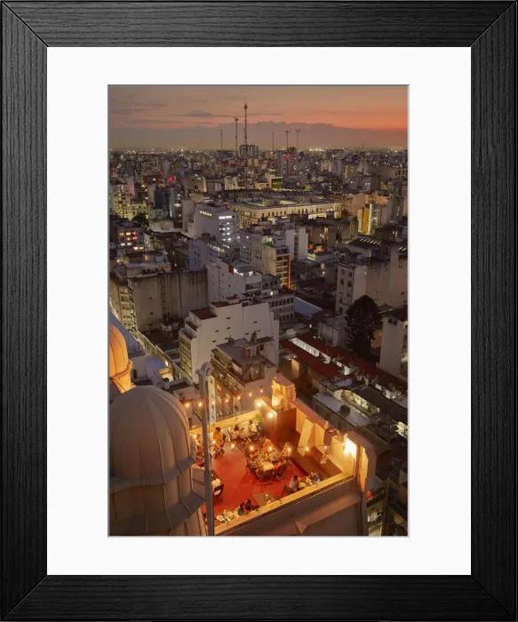 Framed Print : The Salon 1923'Rooftop Bar of the Palacio Barolo and the Buenos Aires skyline at sunset, Argentina. (PR) Framed Print : The Salon 1923'Rooftop Bar of the Palacio Barolo and the Buenos Aires skyline at sunset, Argentina. (PR)