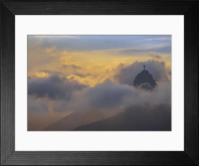 Framed Print : Brazil, Rio de Janeiro, Christ the Redeemer statue on Corcovado Hill surrounded by golden clouds at sundown Framed Print : Brazil, Rio de Janeiro, Christ the Redeemer statue on Corcovado Hill surrounded by golden clouds at sundown