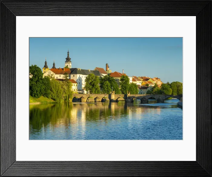 Framed Print : Pisek Stone bridge over Otava River with Pisek Castle in background, Pisek, South Bohemian Region, Czech Republic