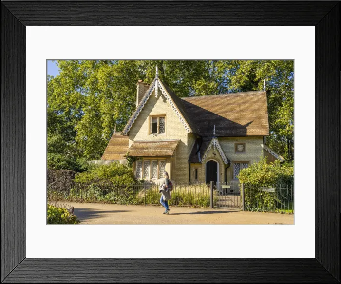 Framed Print : A woman walking past Buckhill Logde, Kensington Gardens, Hyde park, London, England, UK Framed Print : A woman walking past Buckhill Logde, Kensington Gardens, Hyde park, London, England, UK