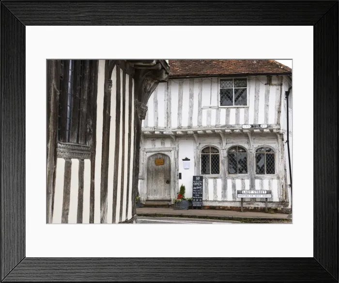 Framed Print : Timber framed medieval buildings in Lavenham, Suffolk, England Framed Print : Timber framed medieval buildings in Lavenham, Suffolk, England