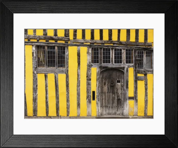 Framed Print : Timber framed medieval buildings in Lavenham, Suffolk, England Framed Print : Timber framed medieval buildings in Lavenham, Suffolk, England