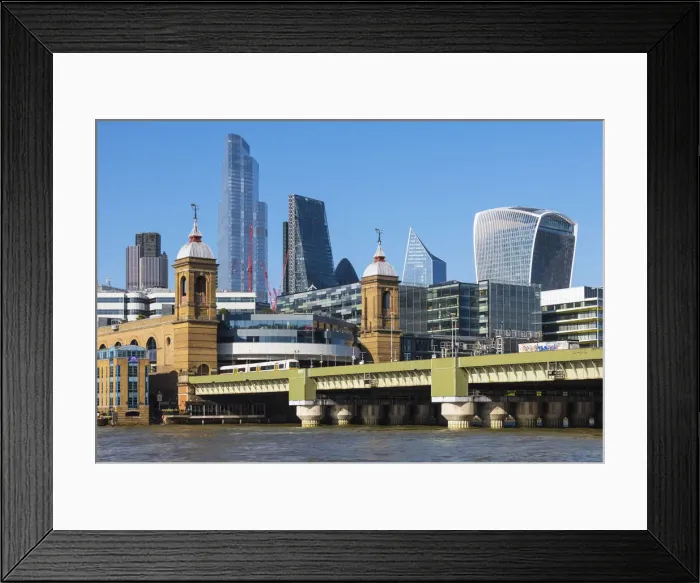 Framed Print : View towards skyscrapers of the City of London across Cannon Street Railway Bridge, London, England Framed Print : View towards skyscrapers of the City of London across Cannon Street Railway Bridge, London, England