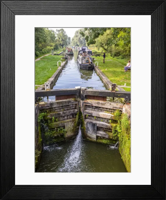 Framed Print : Boats going through a lock in Great Bedwyn, Marlborough, Wiltshire, England, United Kingdom Framed Print : Boats going through a lock in Great Bedwyn, Marlborough, Wiltshire, England, United Kingdom