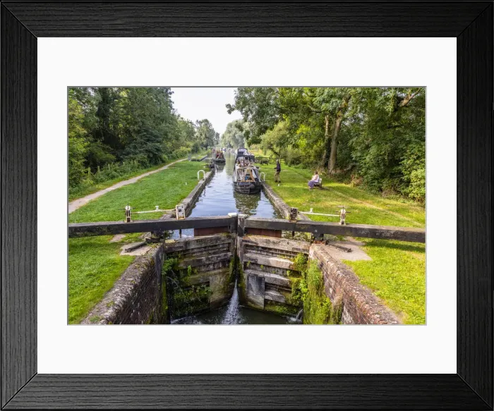 Framed Print : Boats going through a lock in Great Bedwyn, Marlborough, Wiltshire, England, United Kingdom Framed Print : Boats going through a lock in Great Bedwyn, Marlborough, Wiltshire, England, United Kingdom