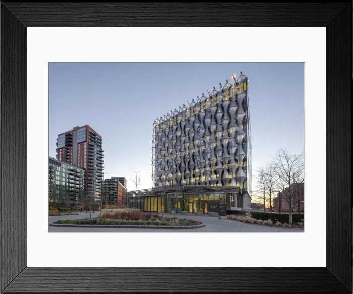 Framed Print : UK, London, Vauxhall, Borough of Wandsworth. Illuminated facade of the USA Embassy (Architect: Kieran Timberlake, 2017), Embassy Gardens and new construction in the Nine Elms district Framed Print : UK, London, Vauxhall, Borough of Wandsworth. Illuminated facade of the USA Embassy (Architect: Kieran Timberlake, 2017), Embassy Gardens and new construction in the Nine Elms district