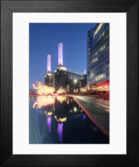 Framed Print : UK, England, London, Borough of Wandsworth. Night view of Battersea Power Station (architects: Leonard Pearce & Giles Gilbert Scott, 1929-19350 & modern retail and residential buildings by Frank Gehry) Framed Print : UK, England, London, Borough of Wandsworth. Night view of Battersea Power Station (architects: Leonard Pearce & Giles Gilbert Scott, 1929-19350 & modern retail and residential buildings by Frank Gehry)