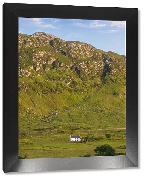 Ireland, Co. Donegal, Traditional house in rural mountainous setting