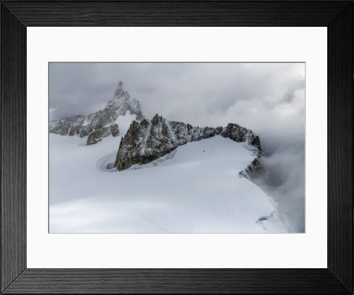Framed Print : The Dent du Geant (Dente del Gigante in italian) during a windy summer day from the Mont Blanc Skyway panoramic viewpoint Framed Print : The Dent du Geant (Dente del Gigante in italian) during a windy summer day from the Mont Blanc Skyway panoramic viewpoint