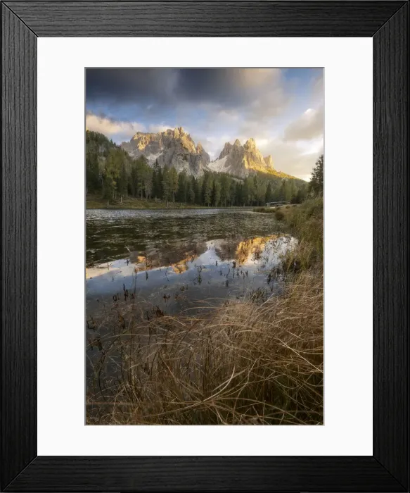 Framed Print : The Cadini di Misurina reflecting in the Antorno lake during an early autumn sunset, with some bushes in the foreground. Dolomites, Italy Framed Print : The Cadini di Misurina reflecting in the Antorno lake during an early autumn sunset, with some bushes in the foreground. Dolomites, Italy