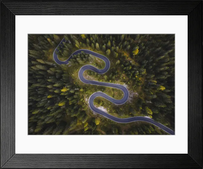 Framed Print : An aerial view of the road leading to the Giau Pass from Cortina d Ampezzo, in the Dolomites, Italy Framed Print : An aerial view of the road leading to the Giau Pass from Cortina d Ampezzo, in the Dolomites, Italy