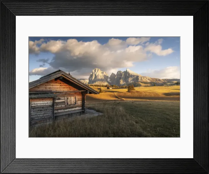 Framed Print : An old cabin lost in the meadows of the Alpe di Siusi (Seiser Alm) during an early autumn sunset, with the Sassolungo and Sassopiatto in the background. Dolomites, Italy Framed Print : An old cabin lost in the meadows of the Alpe di Siusi (Seiser Alm) during an early autumn sunset, with the Sassolungo and Sassopiatto in the background. Dolomites, Italy