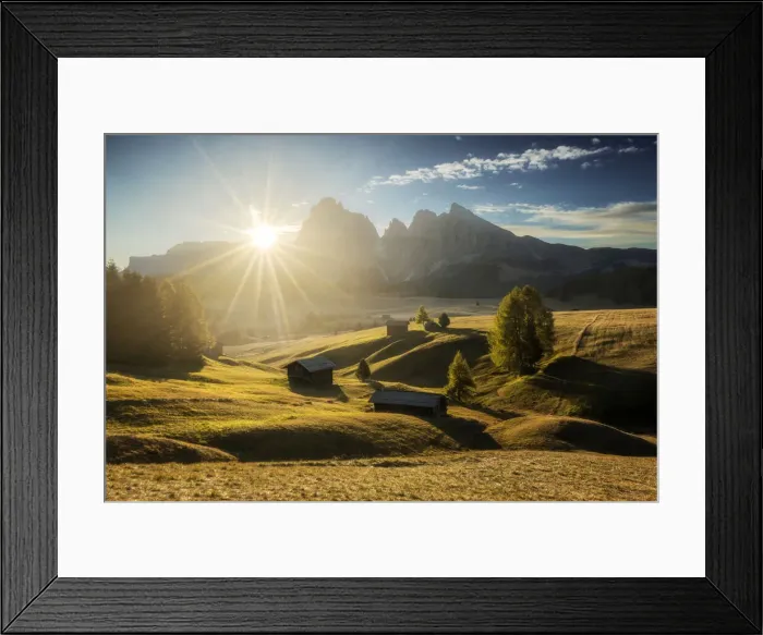 Framed Print : Some typical cabins in the meadows of the Alpe di Siusi (Seiser Alm) during an early autumn sunrise, with the Sassolungo and Sassopiatto in the background. Dolomites, Italy Framed Print : Some typical cabins in the meadows of the Alpe di Siusi (Seiser Alm) during an early autumn sunrise, with the Sassolungo and Sassopiatto in the background. Dolomites, Italy