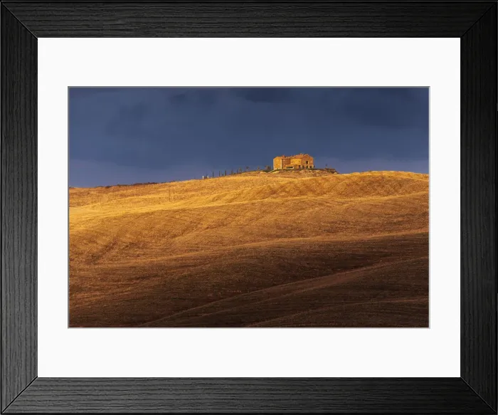 Framed Print : A lonely countryhouse and some rolling hills illuminated by the warm sunset light in autumn, right before a storm rolled in, not far from Montalcino, Val d Orcia, Tuscany, Italy Framed Print : A lonely countryhouse and some rolling hills illuminated by the warm sunset light in autumn, right before a storm rolled in, not far from Montalcino, Val d Orcia, Tuscany, Italy