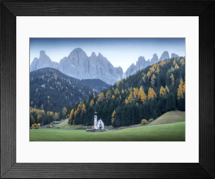 Framed Print : The small chapel of St. Johann in Ranui at twilight during a gloomy autumn evening, with the Odle mountains in the background. Dolomites, Italy Framed Print : The small chapel of St. Johann in Ranui at twilight during a gloomy autumn evening, with the Odle mountains in the background. Dolomites, Italy
