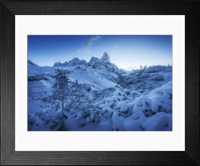 Framed Print : The first snow of the year in late autumn at Rolle Pass, with the majestic Pale di San Martino in the background and the rising moon in the sky. Dolomites, Italy