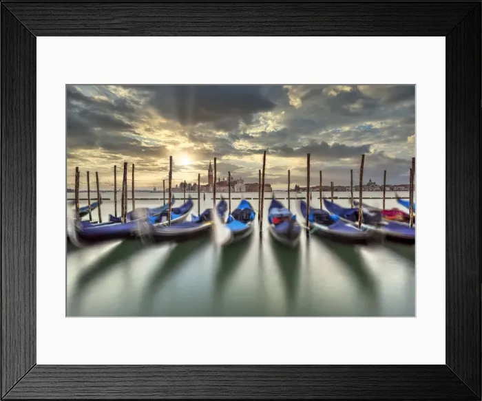 Framed Print : Scenic sunrise with moored gondolas and San Giorgio Maggiore island in the backdrop, Venice, Veneto, Italy Framed Print : Scenic sunrise with moored gondolas and San Giorgio Maggiore island in the backdrop, Venice, Veneto, Italy