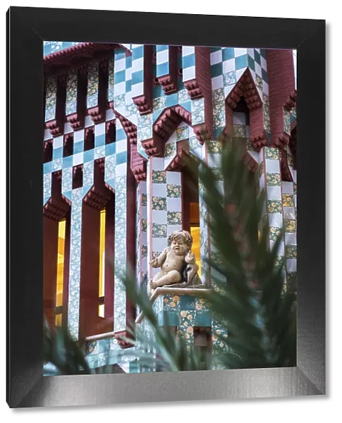 Spain, Barcelona, Casa Vicens. Putto in the decoration of the rear facade
