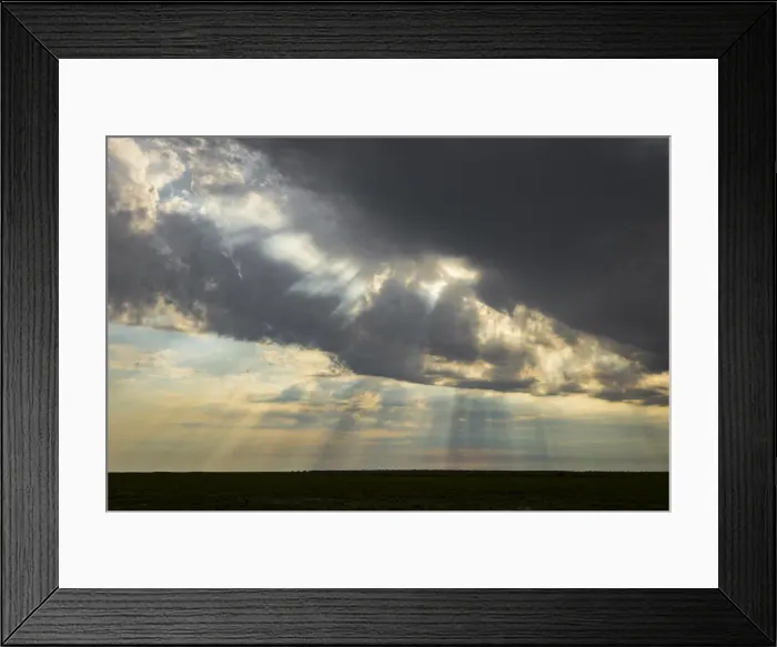 Framed Print : Sun beams breaking through storm clouds, Liuwa Plain National Park, Zambia Framed Print : Sun beams breaking through storm clouds, Liuwa Plain National Park, Zambia