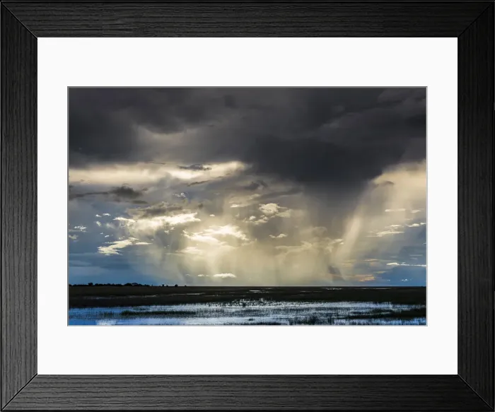 Framed Print : Storm and rain clouds over grassland at sunset, Liuwa Plain National Park, Zambia Framed Print : Storm and rain clouds over grassland at sunset, Liuwa Plain National Park, Zambia