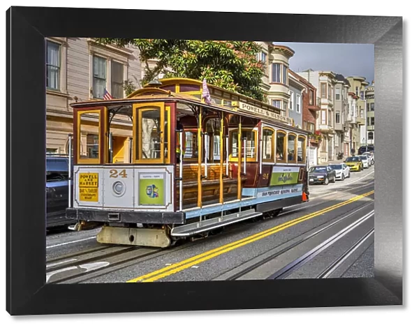Powell and Market line cable car in a street of Russian Hill district, San Francisco, California, USA
