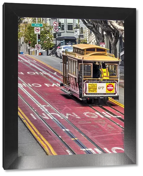 Powell and Market line cable car climbing a steep street, San Francisco, California, USA