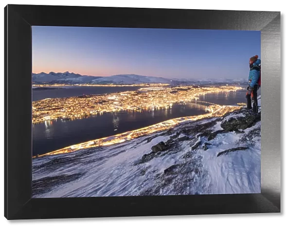 The view of the city of Tromso at dusk from the mountain top, Troms county, Northern Norway