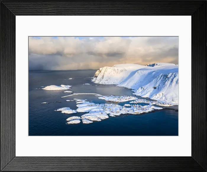 Framed Print : Coastal village of Sorvaer covered with snow during sunrise in the cold arctic winter (Soroya Island, Hasvik, Troms og Finnmark, Norway) Framed Print : Coastal village of Sorvaer covered with snow during sunrise in the cold arctic winter (Soroya Island, Hasvik, Troms og Finnmark, Norway)