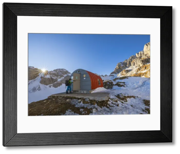 Framed Print : A trekker enters the Citt di Clusone Bivouac, Castione della Pesolana, Prealpi Orobie, Bergamo, Lombardy, Italy (MR) Framed Print : A trekker enters the Citt di Clusone Bivouac, Castione della Pesolana, Prealpi Orobie, Bergamo, Lombardy, Italy (MR)