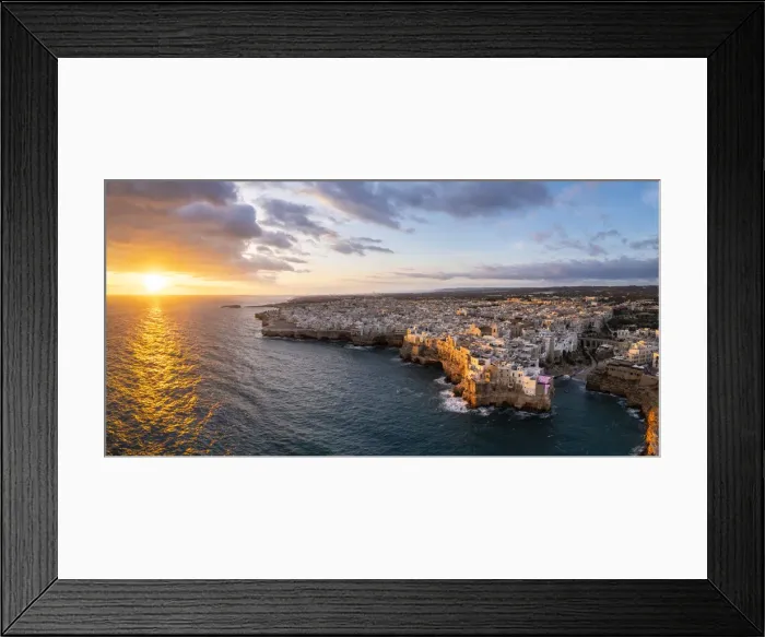 Framed Print : Overhanging houses of Polignano a Mare at sunrise. Bari district, Apulia, Italy Framed Print : Overhanging houses of Polignano a Mare at sunrise. Bari district, Apulia, Italy