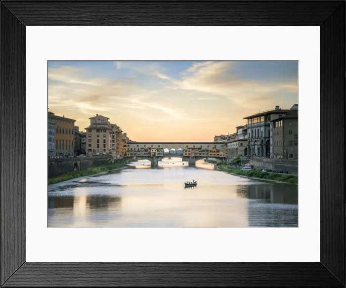 Framed Print : Italy, Tuscany, Florence: the sunset illuminates the Arno river that flows under the Ponte Vecchio