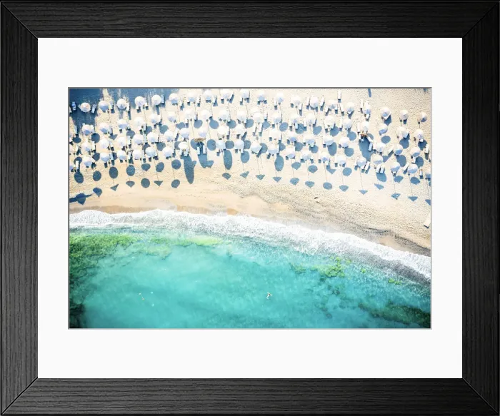 Framed Print : Beach loungers and parasols at Matala beach at dawn, Crete, Greece Framed Print : Beach loungers and parasols at Matala beach at dawn, Crete, Greece