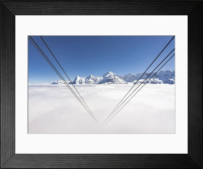Framed Print : Cableway hidden by fog with Eiger, Monch and Jungfrau, Murren Birg, Berner Oberland, Switzerland Framed Print : Cableway hidden by fog with Eiger, Monch and Jungfrau, Murren Birg, Berner Oberland, Switzerland