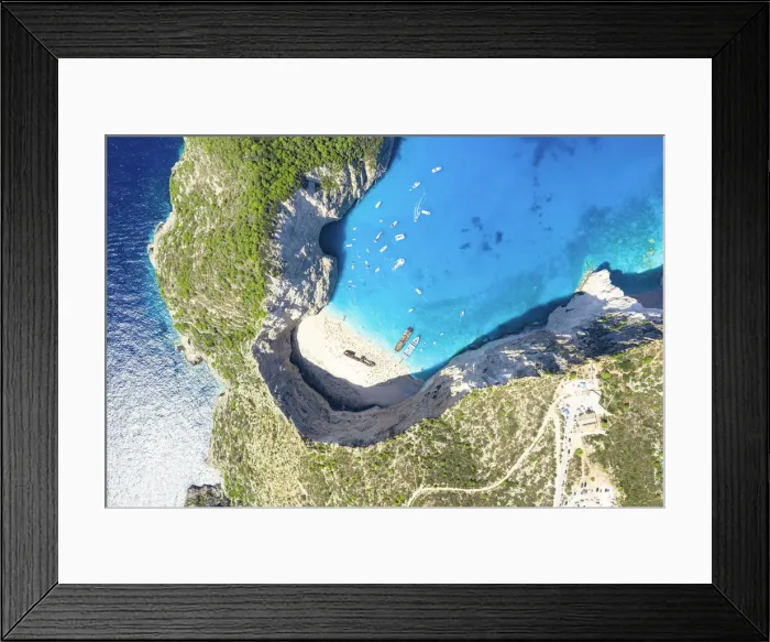 Framed Print : Turquoise lagoon surrounding the famous Shipwreck Beach (Navagio Beach) from above, aerial view, Zakynthos island, Greece Framed Print : Turquoise lagoon surrounding the famous Shipwreck Beach (Navagio Beach) from above, aerial view, Zakynthos island, Greece