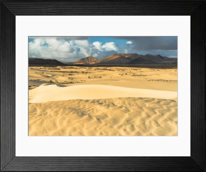 Framed Print : Volcanic mountains view from the sand dunes of desert, Corralejo Natural Park, Fuerteventura, Canary Islands, Spain Framed Print : Volcanic mountains view from the sand dunes of desert, Corralejo Natural Park, Fuerteventura, Canary Islands, Spain