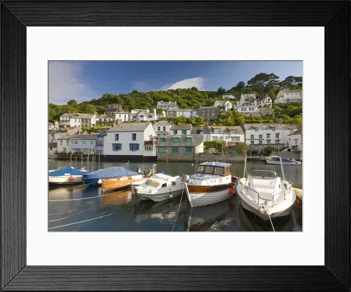 Framed Print : Boats and cottages surround the pretty harbour in the picture postcard Cornish fishing village of Polperro, Cornwall, England. Summer (June) 2010 Framed Print : Boats and cottages surround the pretty harbour in the picture postcard Cornish fishing village of Polperro, Cornwall, England. Summer (June) 2010