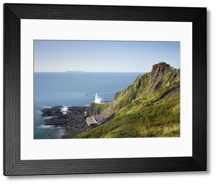Framed Print : Hartland Point Lighthouse and Lundy Island on the horizon, Devon, England. Summer (September) 2010 Framed Print : Hartland Point Lighthouse and Lundy Island on the horizon, Devon, England. Summer (September) 2010