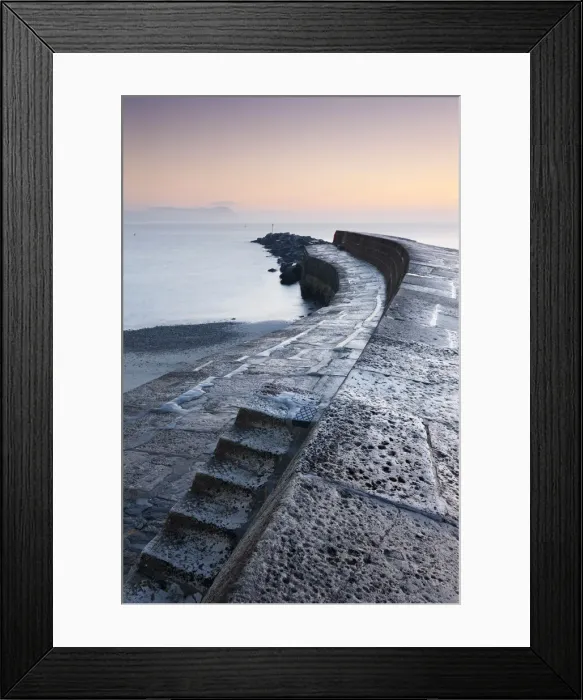 Framed Print : Steps leading onto the Cobb harbour wall at Lyme Regis on the Jurassic Coast, Dorset, England. Winter (December) 2010 Framed Print : Steps leading onto the Cobb harbour wall at Lyme Regis on the Jurassic Coast, Dorset, England. Winter (December) 2010