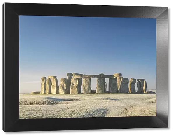 Stonehenge at dawn on a chill frosty winter morning, Wiltshire, England. Winter (January) 2022