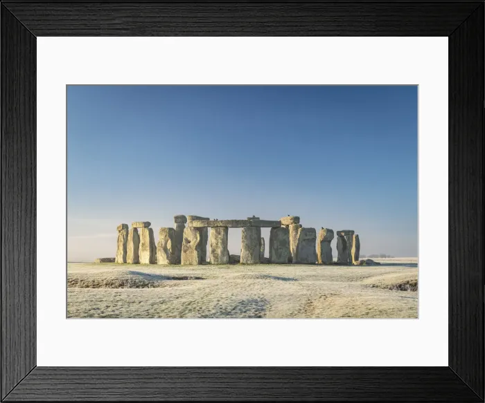 Framed Print : Stonehenge at dawn on a chill frosty winter morning, Wiltshire, England. Winter (January) 2022