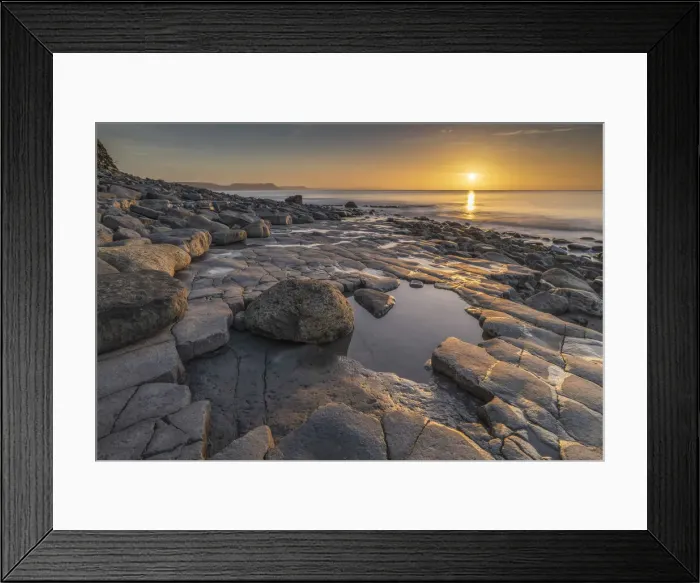 Framed Print : Sunrise over Lyme Bay from the Ammonite Pavement, Lyme Regis, Dorset, England. Winter (February) 2022 Framed Print : Sunrise over Lyme Bay from the Ammonite Pavement, Lyme Regis, Dorset, England. Winter (February) 2022