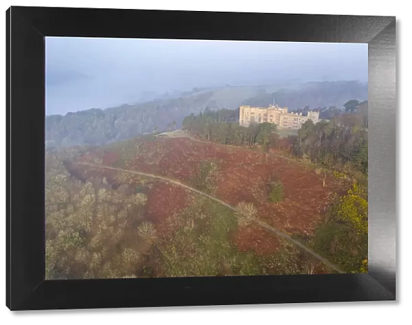 Castle Drogo on a misty winter morning, Dartmoor, Devon, England. Spring (March) 2022
