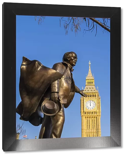 Statue of David Lloyd George, a former British Prime Minister and Big Ben, also known as Elizabeth Tower. Part of the Houses of Parliament and a Unesco World Heritage site, London, England, UK
