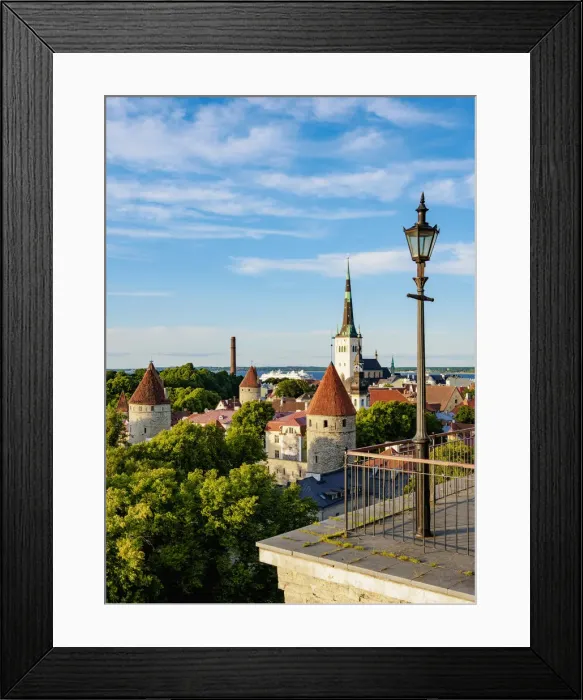 Framed Print : Toompea Hill Lookout Point, view over the Old Town towards St Olafs Church at sunset, Tallinn, Estonia