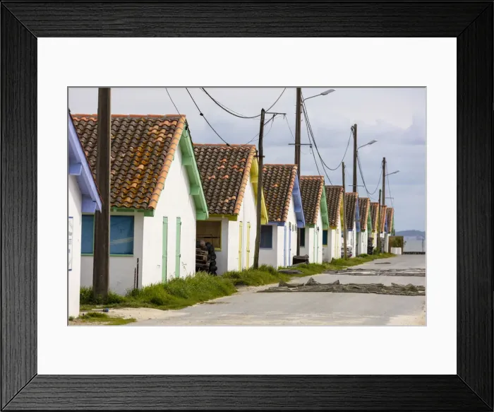 Framed Print : France, Nouvelle-Aquitane, Gironde, Ares, colourful oyster huts at the port Ostreicole