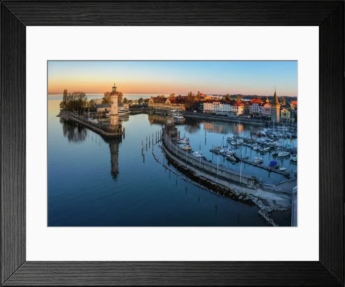 Framed Print : Lindau harbour with Mangturm Tower and Lighthouse at Sunrise, Lake Constance, Swabia, Bavaria, Germany Framed Print : Lindau harbour with Mangturm Tower and Lighthouse at Sunrise, Lake Constance, Swabia, Bavaria, Germany