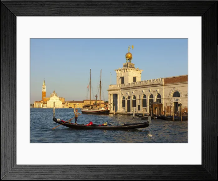 Framed Print : Gondola in front of the Dogana da Mar, behind the Isola di San Giorgio with San Giorgio Maggiore; Venice, Veneto; Italy; Europe Framed Print : Gondola in front of the Dogana da Mar, behind the Isola di San Giorgio with San Giorgio Maggiore; Venice, Veneto; Italy; Europe