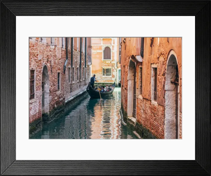 Framed Print : Gondolier and gondola in Cananregio, Venice, Veneto, Italy Framed Print : Gondolier and gondola in Cananregio, Venice, Veneto, Italy